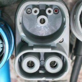 a close up image of electric car charging plugs