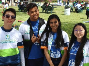 team from milpitas high school smiling and posing in their bike jerseys