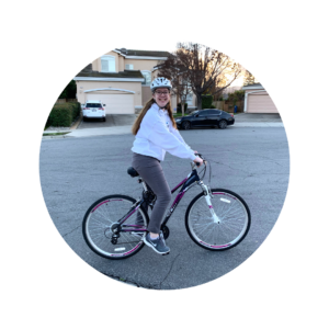 Teen riding a bicycle