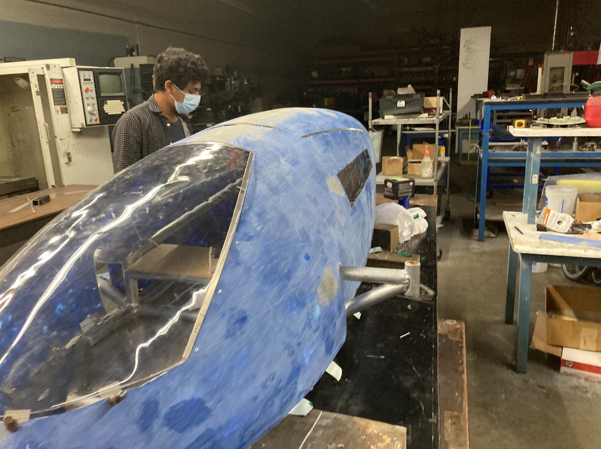 Saratoga Supermileage participant constructing frame of battery electric vehicle