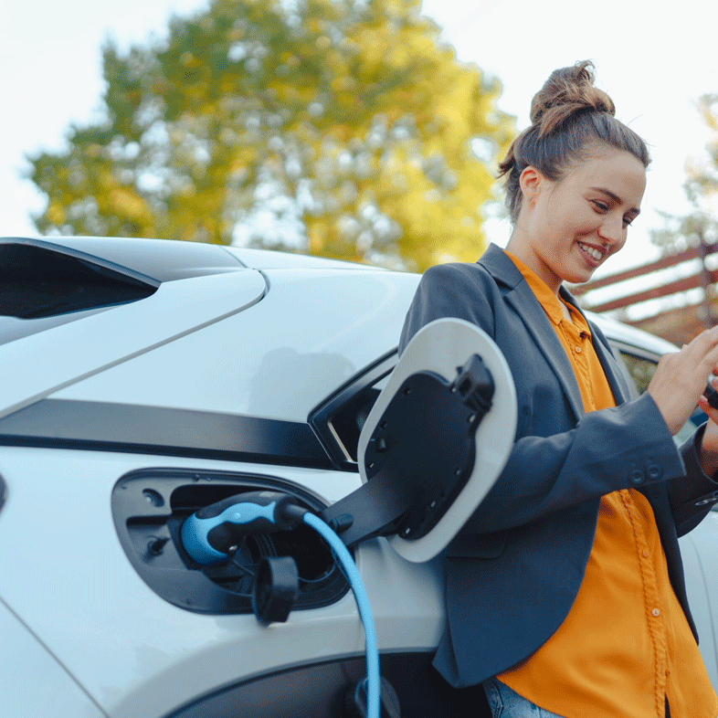 person charging a car